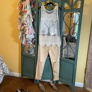 Sneak Peek mid rise skinny jeans only